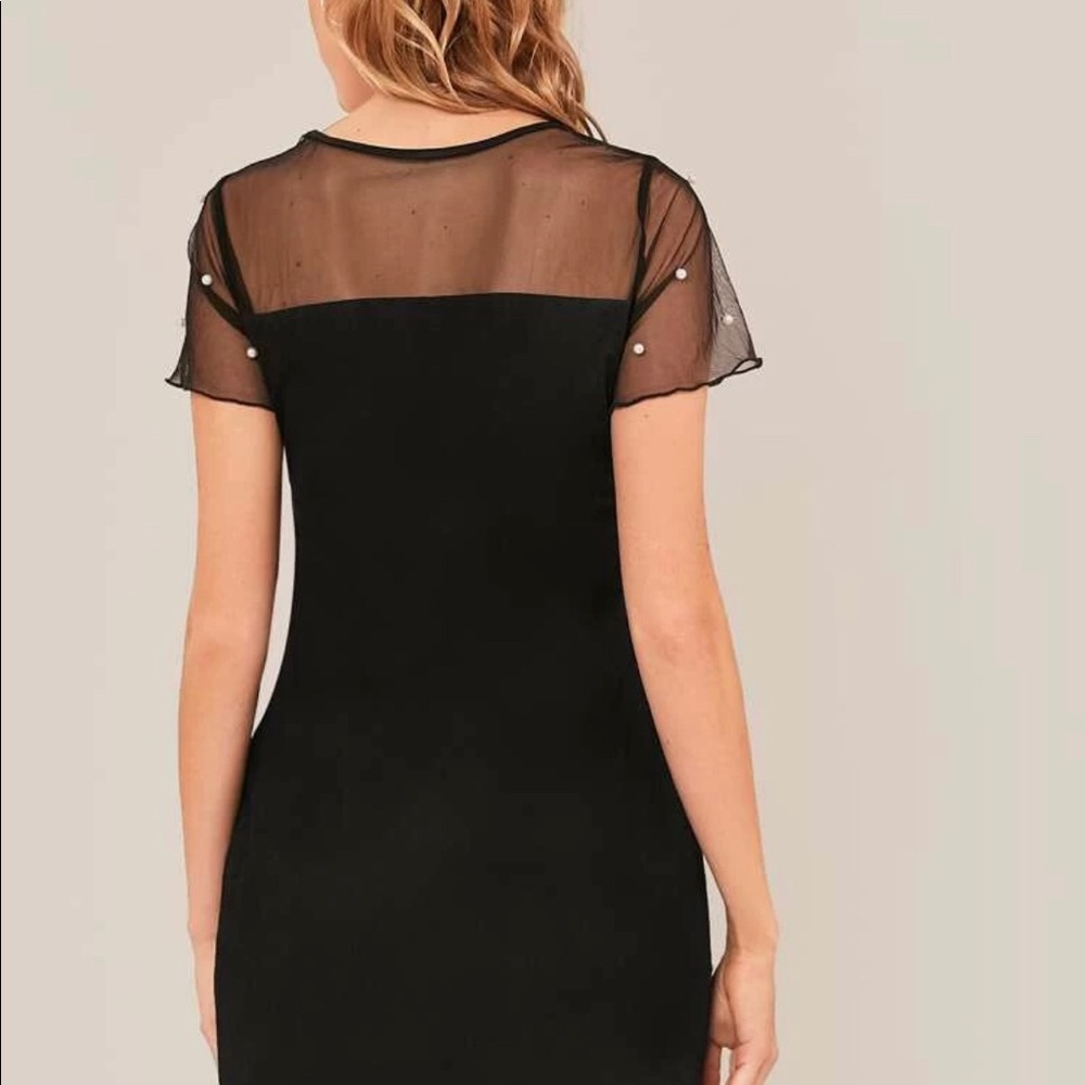 Black dress whit pearls size Medium